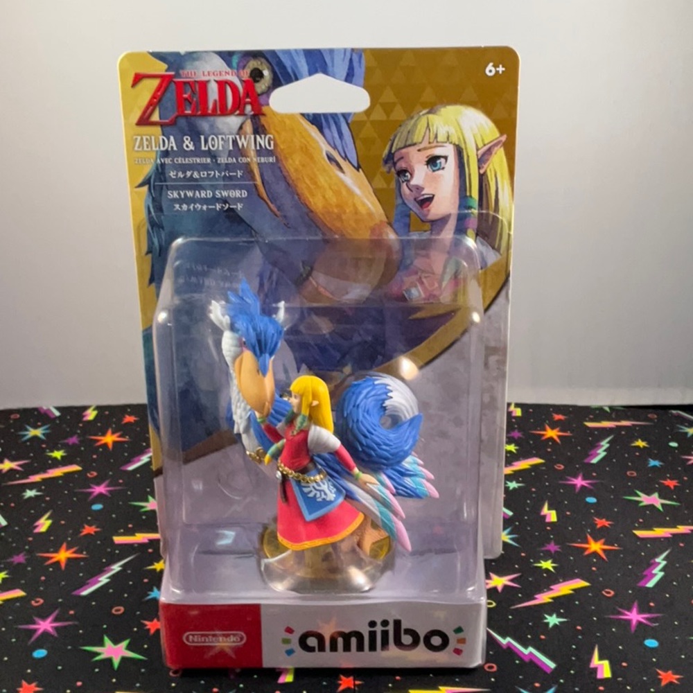 Nintendo Zelda and Loftwing Amiibo. Packaging lightly damaged.